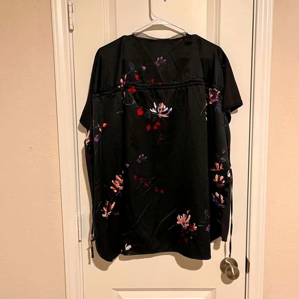 Used black top with silk back